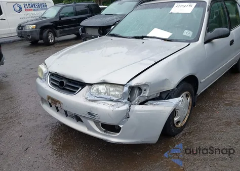 2001 Toyota Corolla Le z USA, uszkodzony, nr VIN 2T1BR12E61C514701